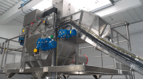 automatic sack discharging minislit bulk materials