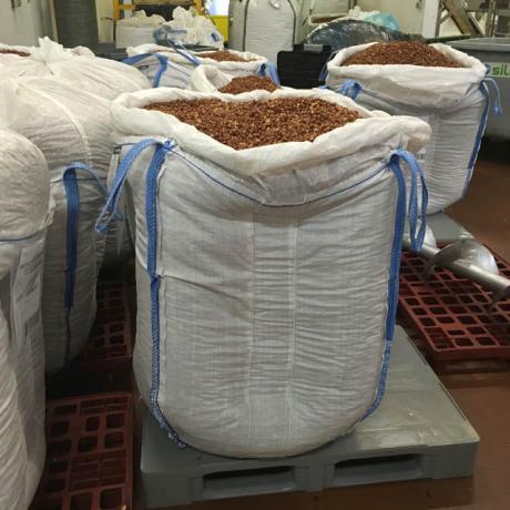 Big bag being packed with bulk products using a Palamatic Process packaging system.